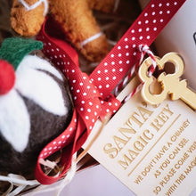 Load image into Gallery viewer, Frank Green Party Cup (assorted colours based on availability) 8mm wide reusable stainless-steel straws, made from durable food grade stainless steel 2 pieces of Juni Moon Christmas felt – Australian designed and handmade in Nepal with 100% wool. Santa’s Magic Key - Handmade and the perfect timeless Christmas addition. Salted Caramel Fudge – handmade, 57.50g May contain traces of nuts Ginger Santa Cookie – Handmade gingerbread santa cookie, contains gluten, egg and dairy